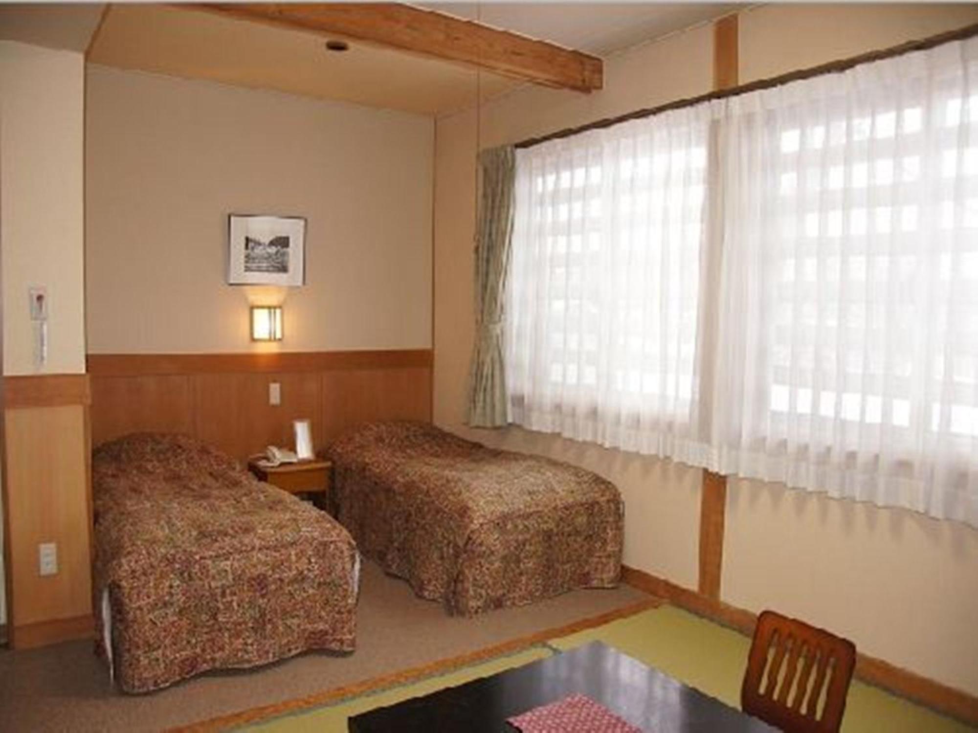 Minamiya 山とねこと遊ぶ宿 みなみ家 Hakuba Quarto foto